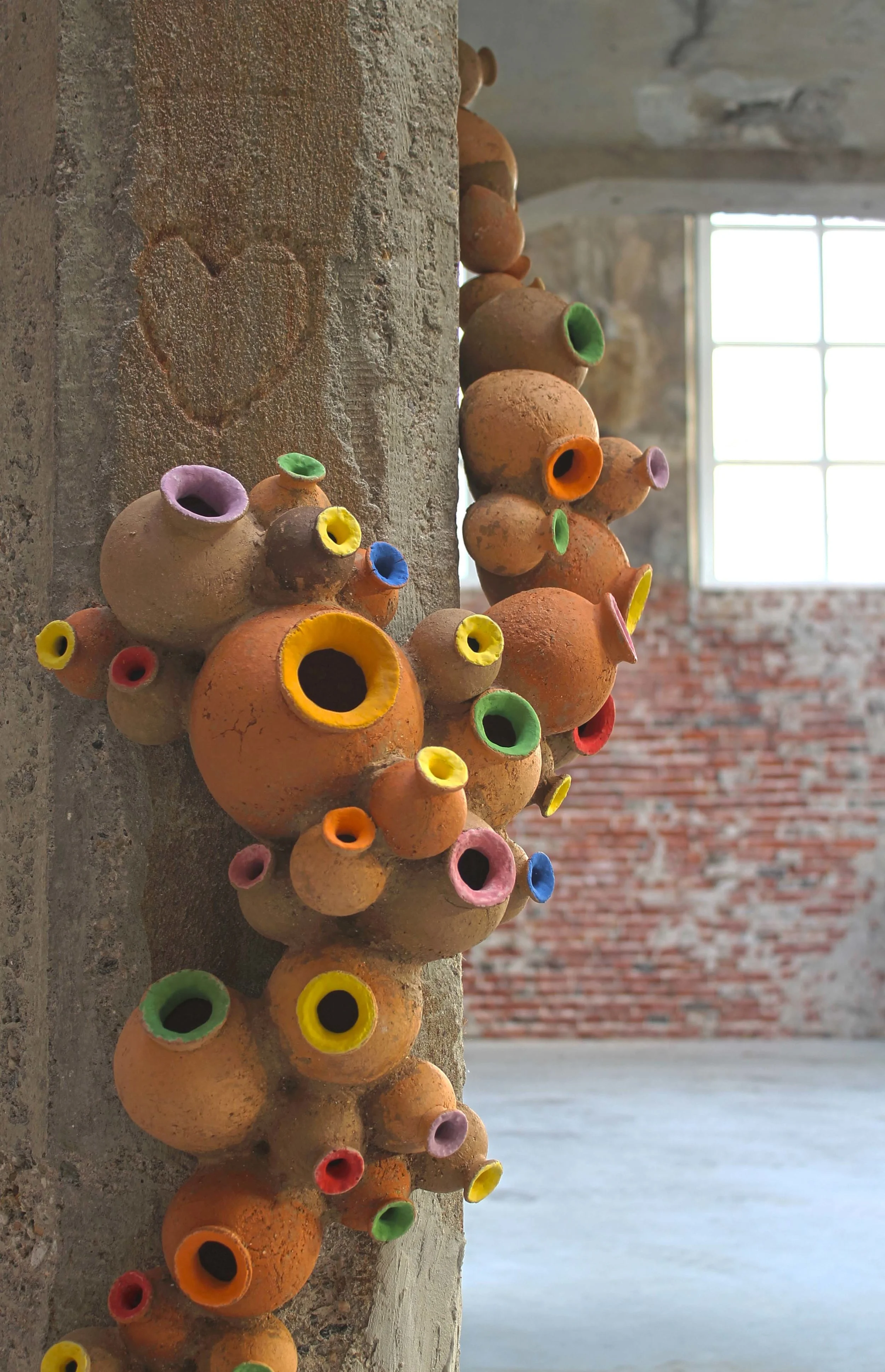A bridge between Architecture and Ceramic Art–The work of Patricia
